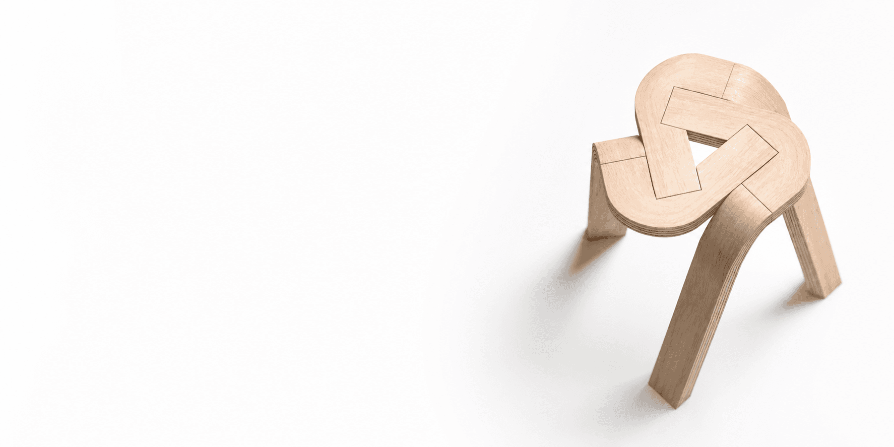 A sculptural knotted solid-oak stool
